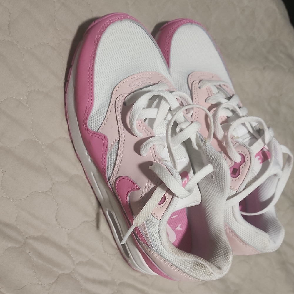 Nike Pink and White Sneakers with Sporty Silhouette